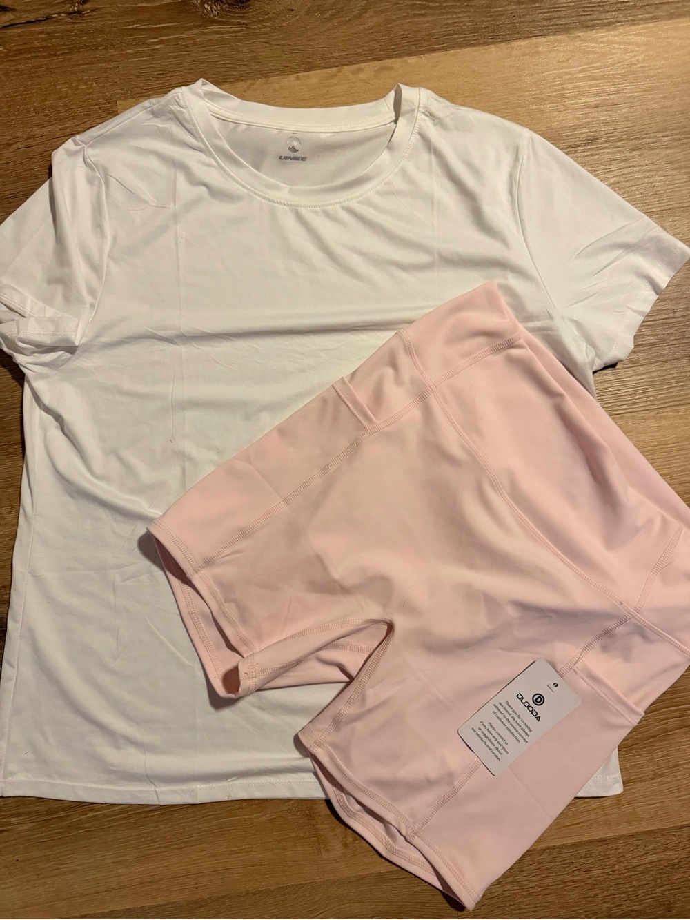 White Active Tee & Pale Pink Workout Shorts